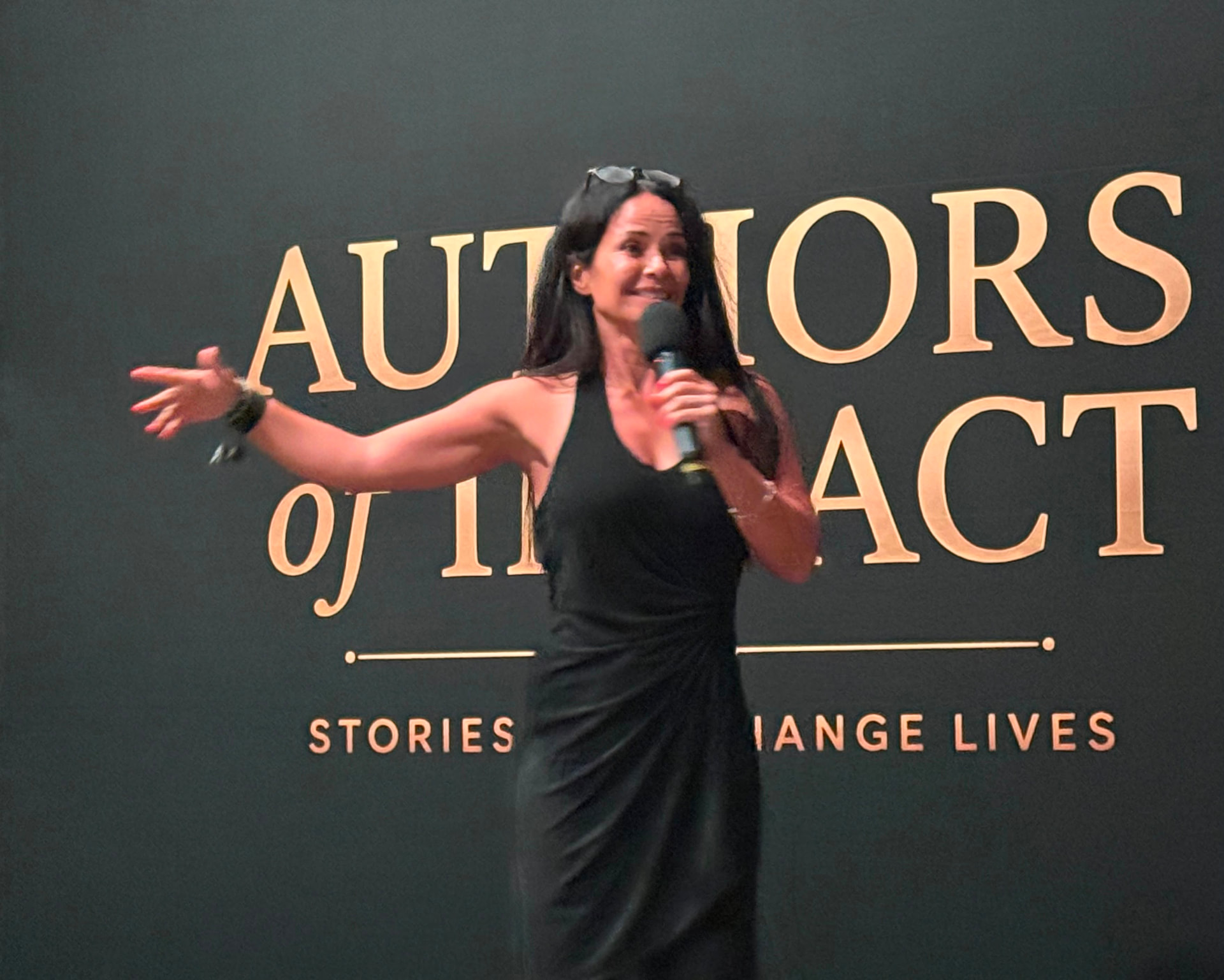 Nevriye Yesil speaking on stage at Authors of Impact